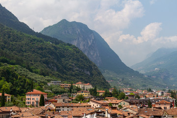 Fototapeta na wymiar Riva del Garda View from the top of Torre Apponale with mountain background