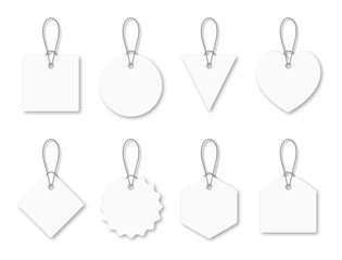 Set of blank white tags with rope. White shopping labels and price tags in different shapes. Mockup and template for paper price tag