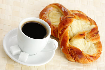 cup of coffee and sweet bun