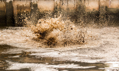 Waste water splashing. Critical of environment