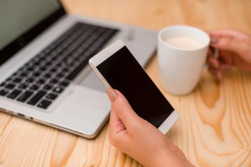 woman laptop computer smartphone mug office supplies technological devices