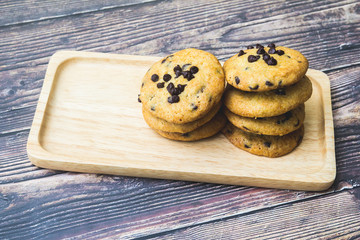 Soft chocolate chip Cookies nutella on the Wooden plate,wood table blackground