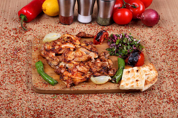 Grilled chicken service on white plate