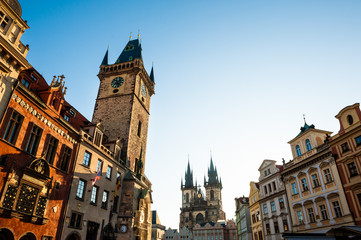Fototapeta na wymiar Old Town Square at sunrise in Prague, Czech Republic. Astronomical clock tower and Tyn church landmarks