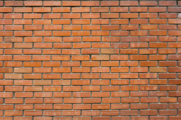 Wall of red facing bricks. Brickwork.
