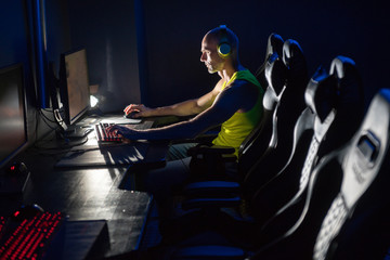 Male eSports player plays electronic games on the computer