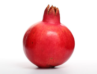 ripe pomegranate isolated on white background
