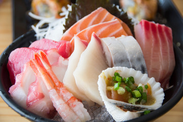 Various kind of raw fish in sushi dish menu, Japanese cuisine.