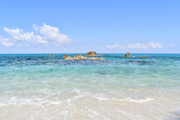 View on tropical sea with rocks in the middle