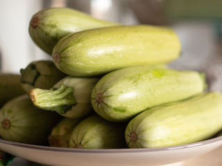 Zucchini. Fresh zucchini, green vegetables courgette, summer squash. Organic green zucchini pattern. Vegetable background texture