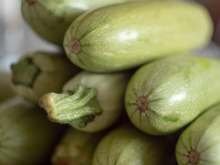 Zucchini. Fresh zucchini, green vegetables courgette, summer squash. Organic green zucchini pattern. Vegetable background texture