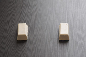 Surfwax on a dark background.