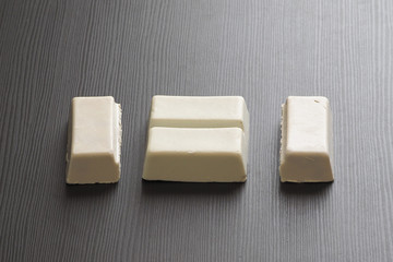 Surfwax on a dark background.