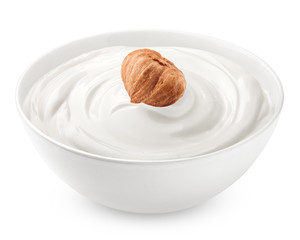 hazelnut, nut with sour cream, yogurt, isolated on white background, clipping path, full depth of field