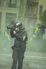 Photographe durant une manifestation.