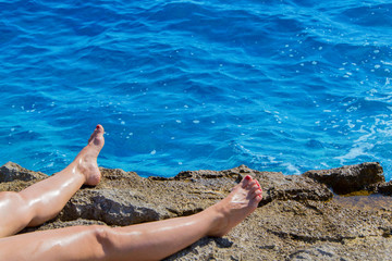 Woman's legs at beach