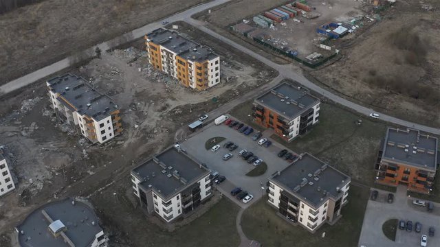 aerial photography of new buildings with equipped territory and a playground.