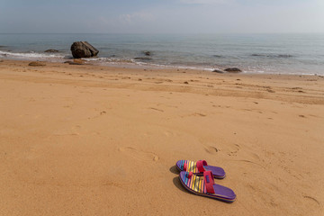 sandals on the beach beach in haikou, hainan, chinа