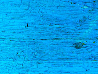 Obraz premium texture of old painted shabby rustic wooden fence made of planks, with rusty nails, grunge background