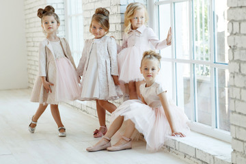 Little fashion girls in a beautiful dress.  © nuzza11