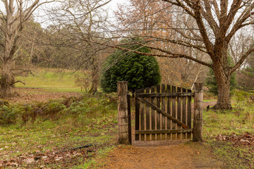 Closed gate on pathway in winter Golden Valley Tree Park