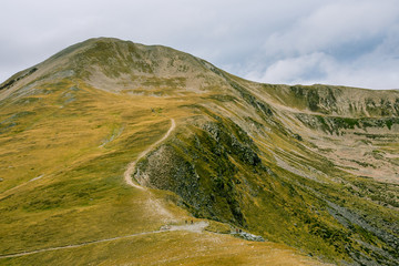 Fototapeta premium The High Peak of Bastiments 2881m (Pyrenees Mountains, Catalonia, Spain).