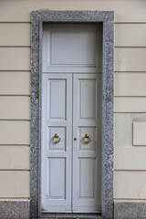 traditional wooden grey  house door Monza, Europe