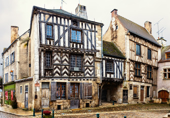 View on the street with ancient  houses in  Noyers (Noyers-sur-Serein), Burgundy,  France. Toned image.