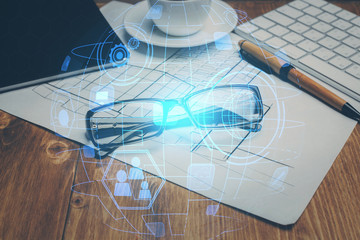Social network theme drawing with glasses on the table background. Concept of people media connection. Double exposure.