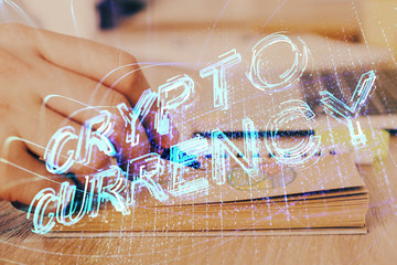 Man's hands working with notes background. Cryptocurrency and finance concept.