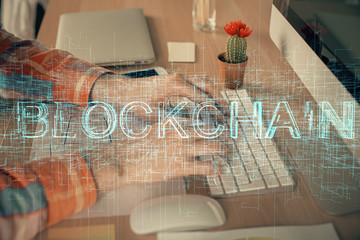 Blockchain theme hud with man working on computer on background. Concept of crypto chain. Double...