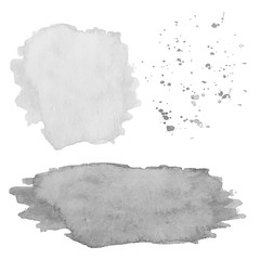 Set of watercolor gray spots and splashes on a white background.
