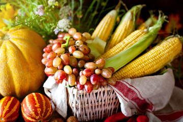The table, decorated with vegetables and fruits. Harvest Festival. Happy Thanksgiving. Autumn background. Selective focus.