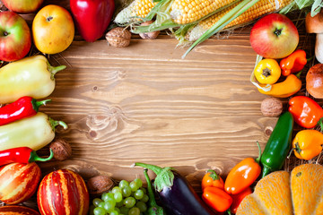 The table, decorated with vegetables and fruits. Harvest Festival. Happy Thanksgiving. Autumn background. Selective focus.