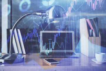 Financial chart drawing and table with computer on background. Multi exposure. Concept of international markets.