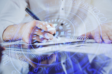 Writing man's hand with data icons.