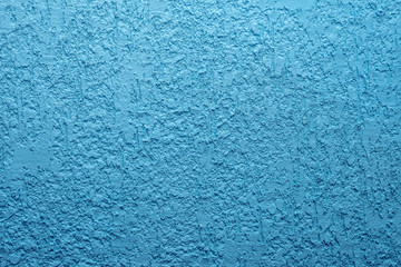 Fototapeta na wymiar Blue cement wall,Rough surface look like blue sand.Background texture design. Old light blue cement texture and background