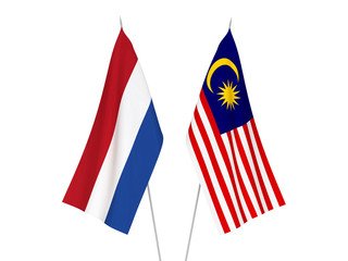Fototapeta na wymiar National fabric flags of Malaysia and Netherlands isolated on white background. 3d rendering illustration.