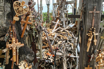 The picture from the hill of crosses by Šiauliai in Lithuania. Many crosses on this religious places and many of them old and abandoned. 