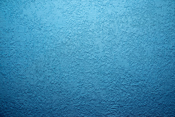 Obraz na płótnie Canvas Blue cement wall,Rough surface look like blue sand.Background texture design. Old light blue cement texture and background
