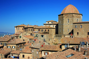 Fototapeta premium Ancient houses in Volterra, Italy