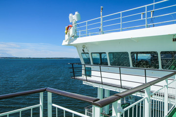 A detail part of a big sea ferry, the captain&acute;s bridge during the hot summer day. 