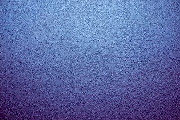 Blue cement wall,Rough surface look like blue sand.Background texture design. Purple cement wall texture background.