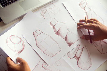 Production designer sketching Drawing Development Design product packaging prototype idea Creative...