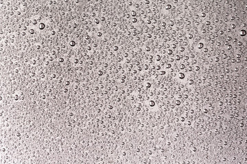 rain drops on metal, water drop on dark black background texture