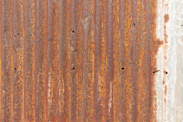 Corrugated zinc metal sheet, rusty zinc pattern.