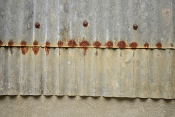 Corrugated zinc metal sheet, rusty zinc pattern.