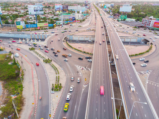 Aerial top view circular junction city transport road with car movement