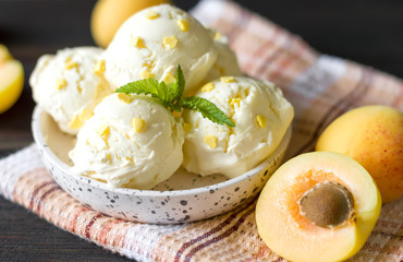 Apricot ice-cream balls. Cold dessert.