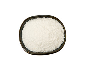 Citric acid in a bowl isolated on a white background. View from above.
